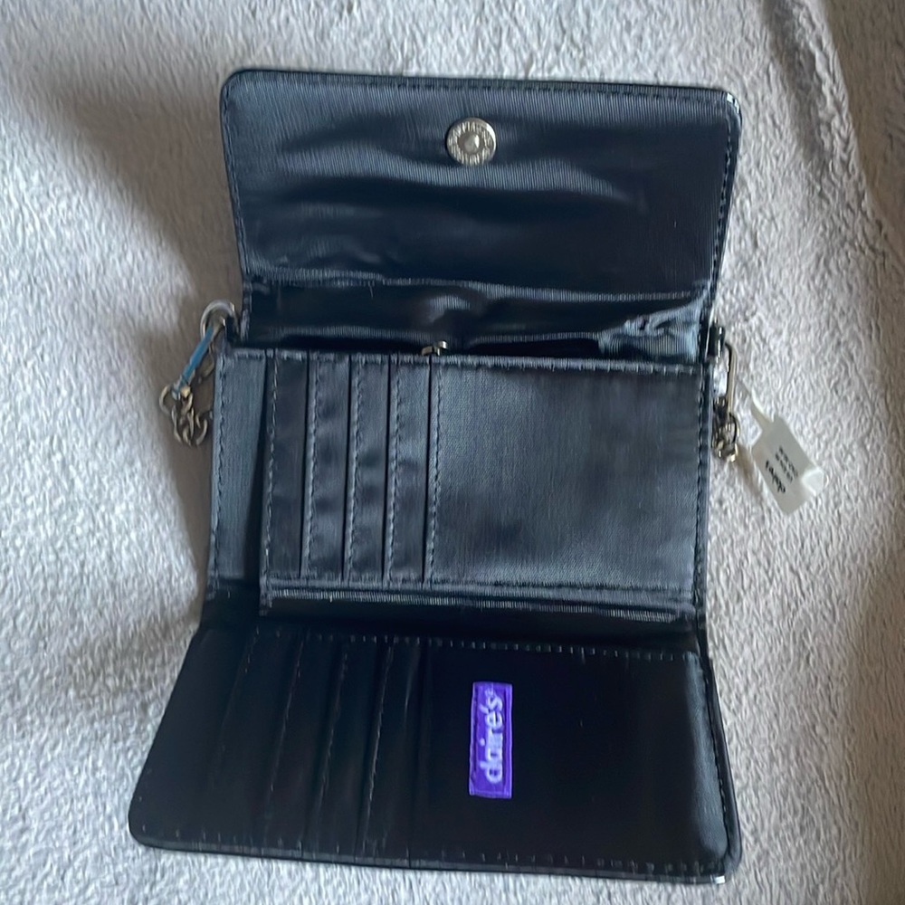 New black cross body bag with tags never used